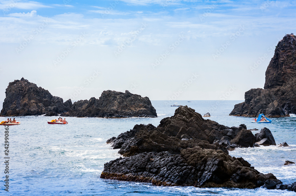 Fototapeta premium Acitrezza rocks of the Cyclops, sea stacks in Catania, Sicily, Italy