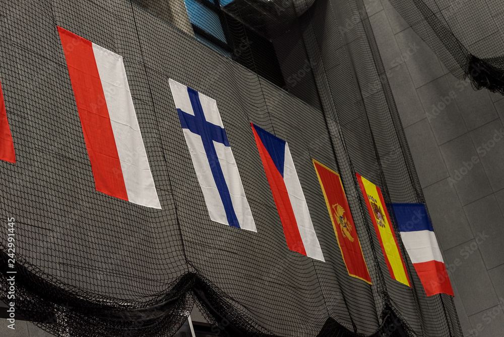 Flags of different countries in sport competitions - obrazy, fototapety, plakaty 