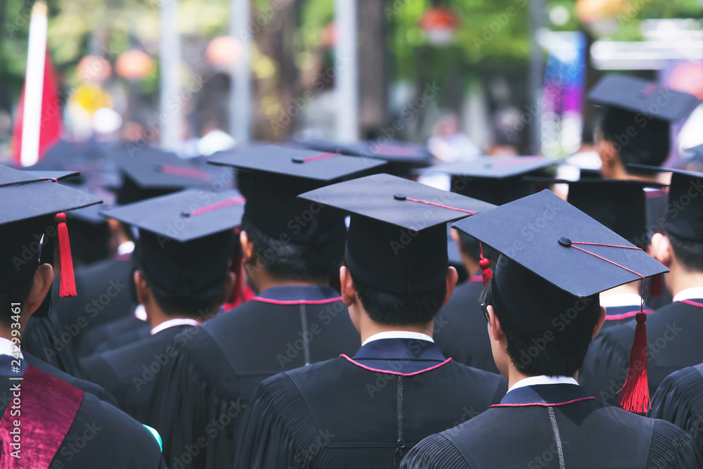 close up hat group of Graduates during commencement. Concept education congratulation in University. Graduation Ceremony in University during commencement. close up hat group of Graduates during commencement. Concept education congratulation in University. Graduation Ceremony in University during commencement.