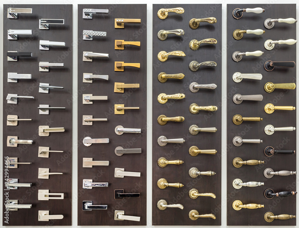 Fototapeta premium showcase with door knob handles in modern shop of doors hardware for loft apartments