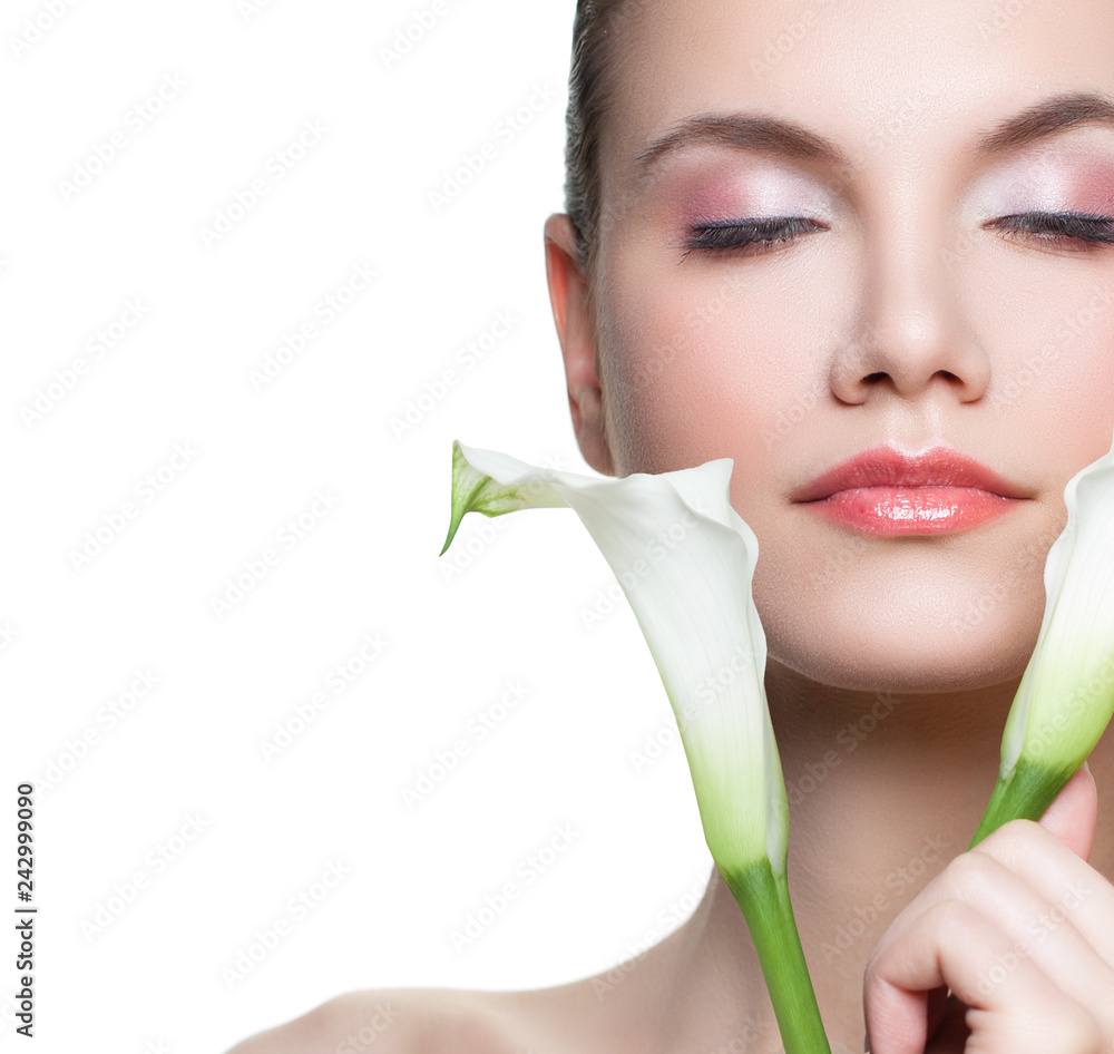 Young female face. Pretty woman with white flower isolated on white background, close up portrait Young female face. Pretty woman with white flower isolated on white background, close up portrait