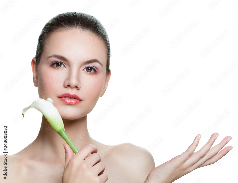 Beautiful woman spa model with empty copy space on the open hand and flower isolated on white background. Skin care concept. Presenting your product Beautiful woman spa model with empty copy space on the open hand and flower isolated on white background. Skin care concept. Presenting your product