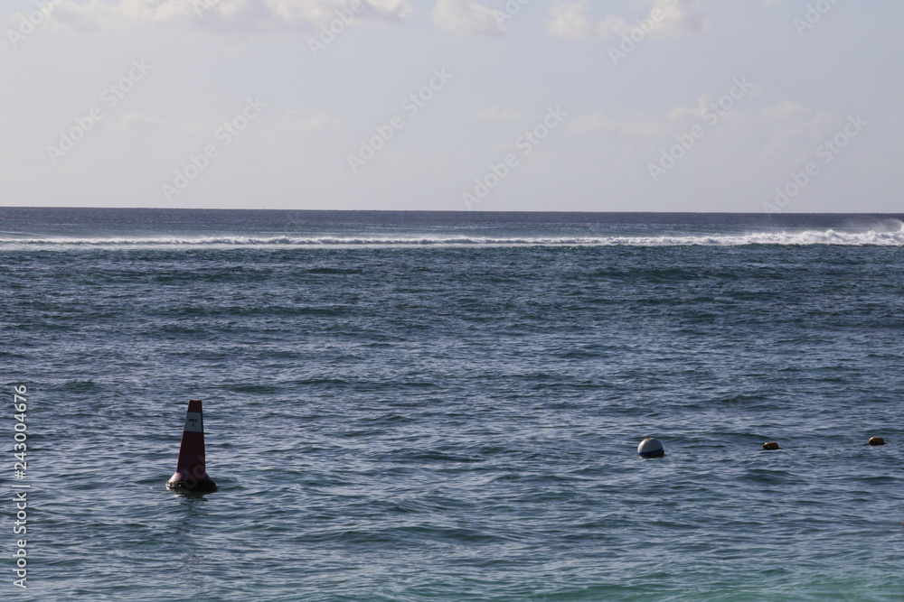 Buoys are swimming and moving because of the waves in the sea