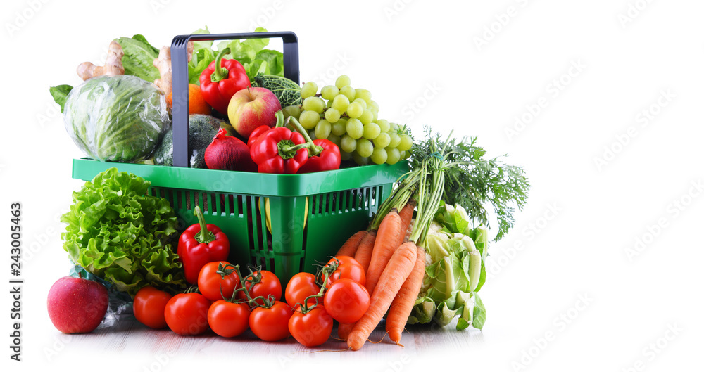 Fresh organic fruits and vegetables in plastic shopping basket Fresh organic fruits and vegetables in plastic shopping basket