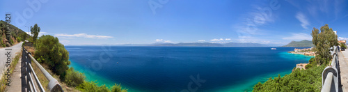 Beautiful sea of the Greek spa resort of Loutra Edipsou on the island of Evia (Euboea), Greece on a sunny day in the Aegean Sea photo