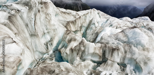 Franz Josef Glacier crampons hike through the blue glacier ice - New Zealand, South Island, NZ