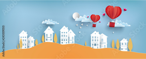 illustrations of love and valentine's day with paper art design. air balloon across the housing.