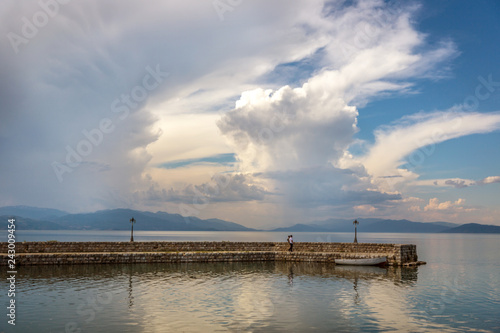 Tourists enjoying the nice scenario of the Lake Ohrid in Macedonia