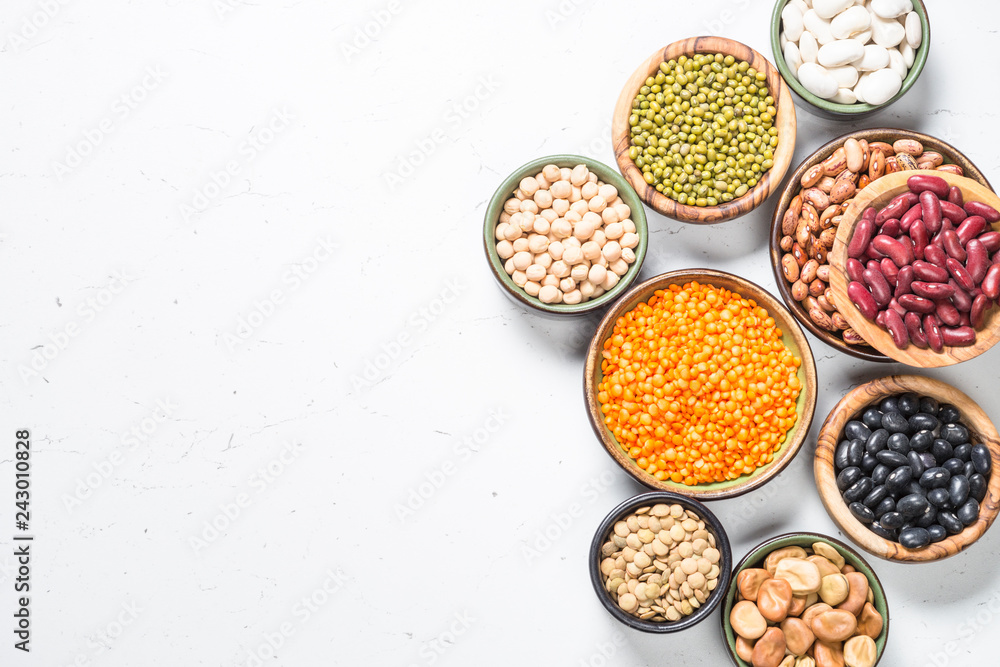 Legumes, lentils, chikpea and beans assortment on white. Legumes, lentils, chikpea and beans assortment on white.