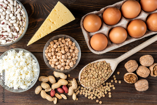 Food rich of protein.Healthy eating and diet concept. Eggs, cheese, cottage cheese, walnut, peanut, green lentil, beans and chick peas.