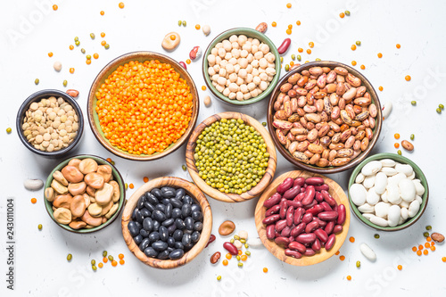 Legumes  lentils  chikpea and beans assortment on white.