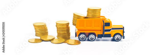 Truck car carry a golden coin stack on white background.