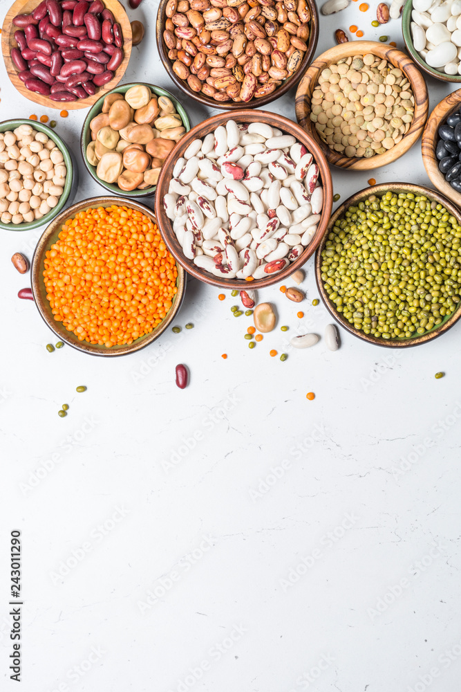 Legumes, lentils, chikpea and beans assortment on white. Legumes, lentils, chikpea and beans assortment on white.