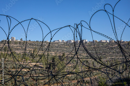 A Palestinian Village Through Barbed Wire photo