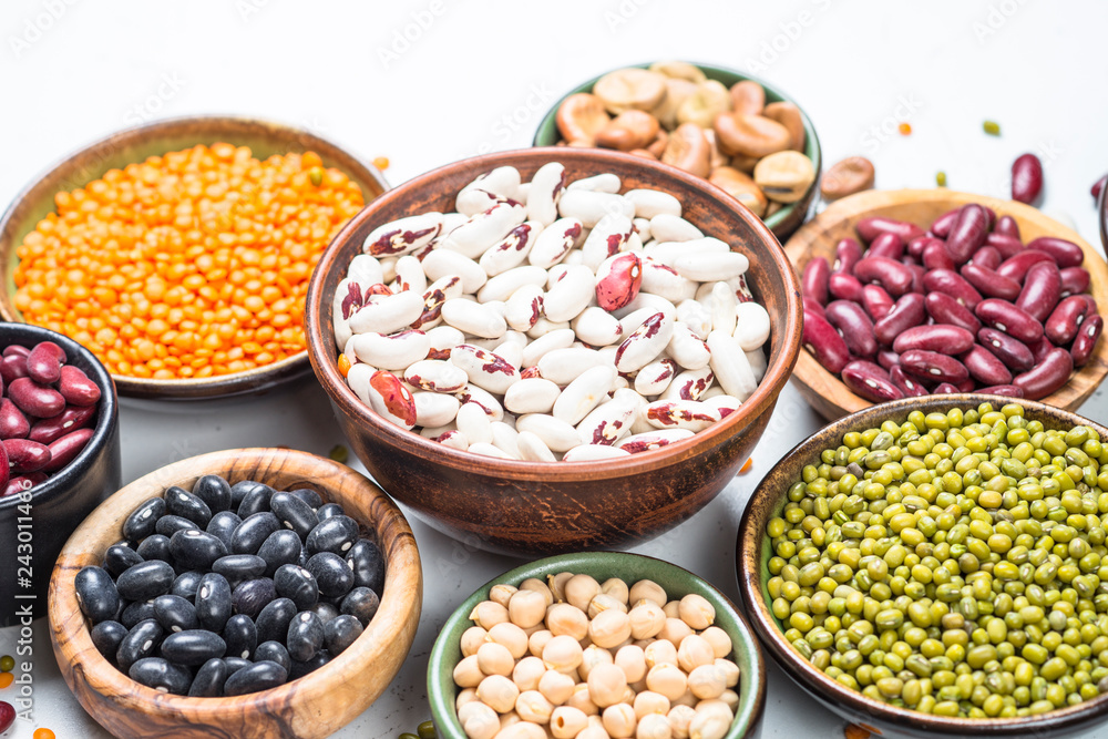 Legumes, lentils, chikpea and beans assortment on white. Legumes, lentils, chikpea and beans assortment on white.