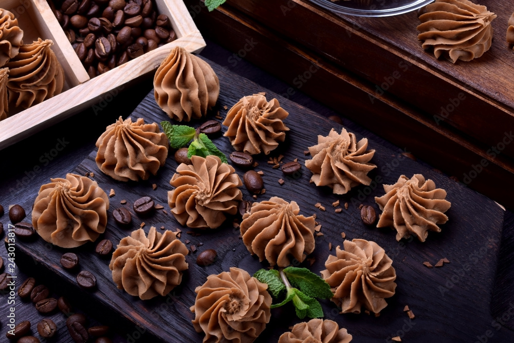 Coffee creamy fudge on a dark wooden board Coffee creamy fudge on a dark wooden board