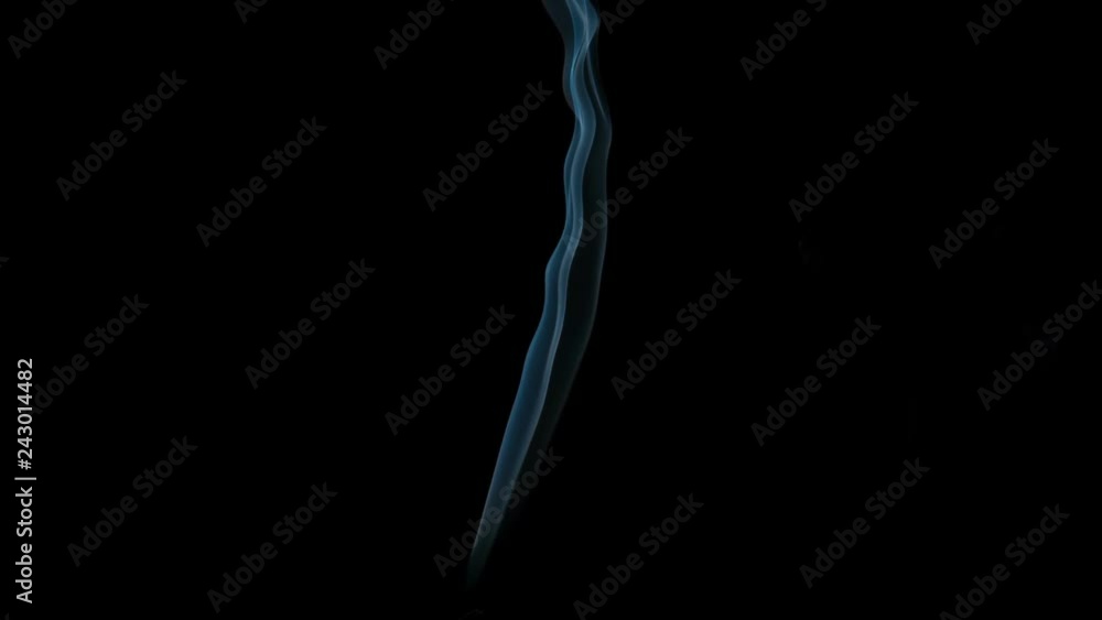 Graceful Bends of the Blue Smoke. Natural Colorful smoke rises up and spins into graceful spirals. Filmed at a speed of 240fps