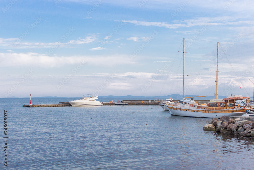 Yachts in the harbor. Coast of the Black Sea. Holidays in Bulgaria. Bay Nessebar. Seascape. Sailing. Boat under sail. Private property. Sea tourism. Summer rest.