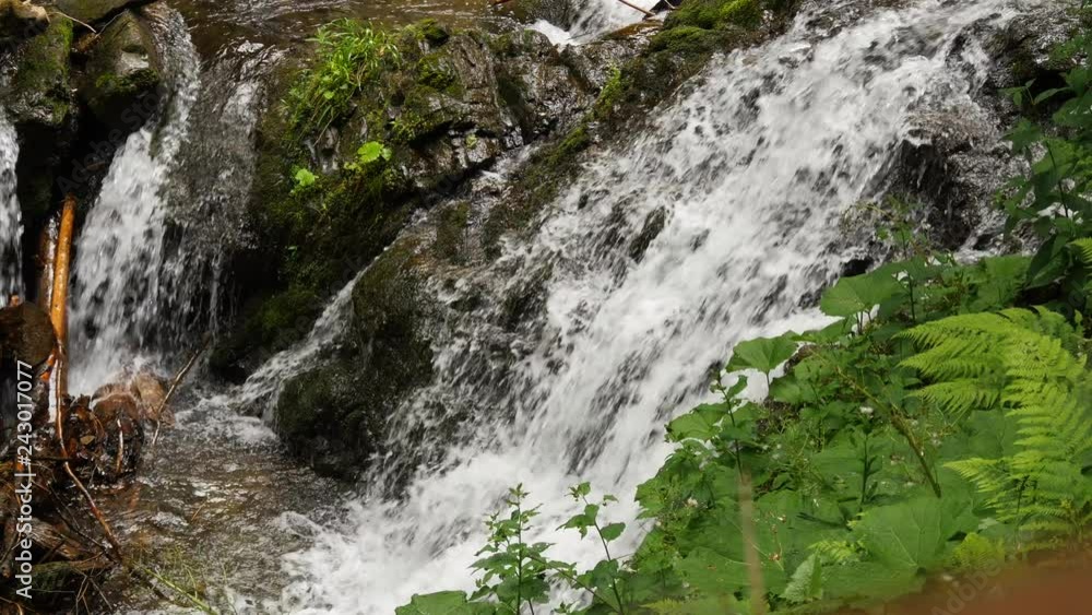 Water flow close up at small water fall Water flow close up at small water fall