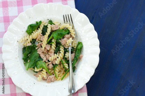Fusilli pasta with spinach and tuna.