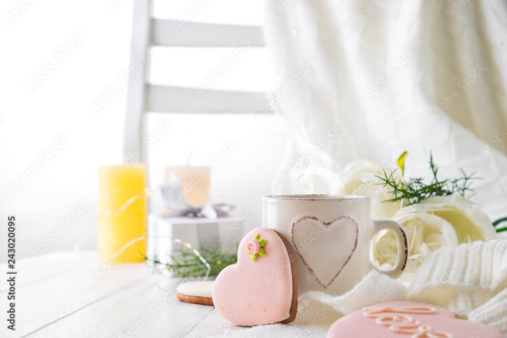 Heart cookies with cup of coffee on wooden background with plaid, copy space Heart cookies with cup of coffee on wooden background with plaid, copy space