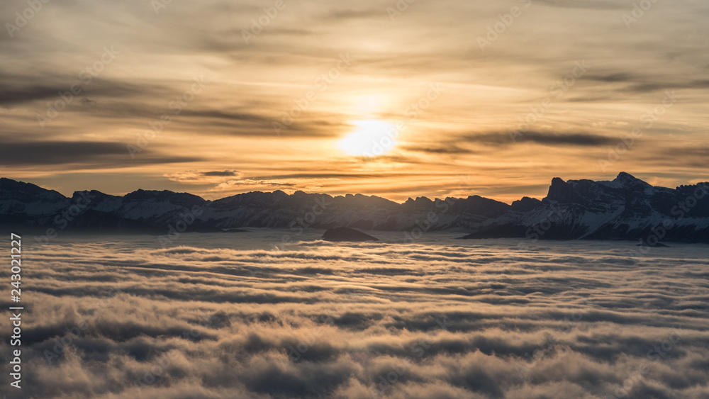 Sunset over sea of clouds in Chamrousse
