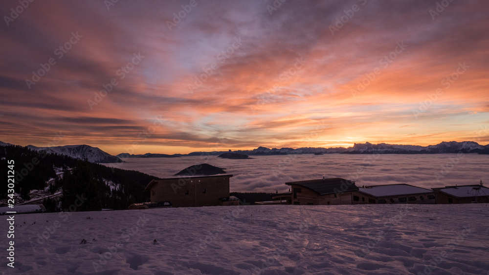 Sunset over sea of clouds in Chamrousse