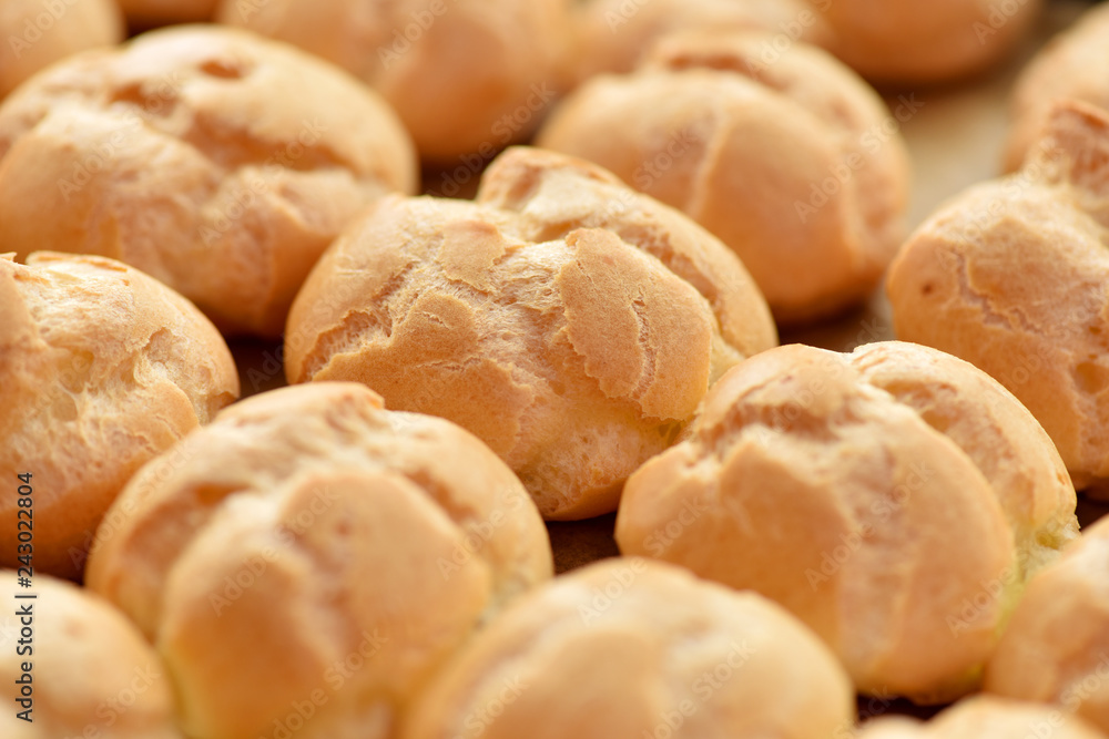Hot baking tray of bread rolls.Flour products.