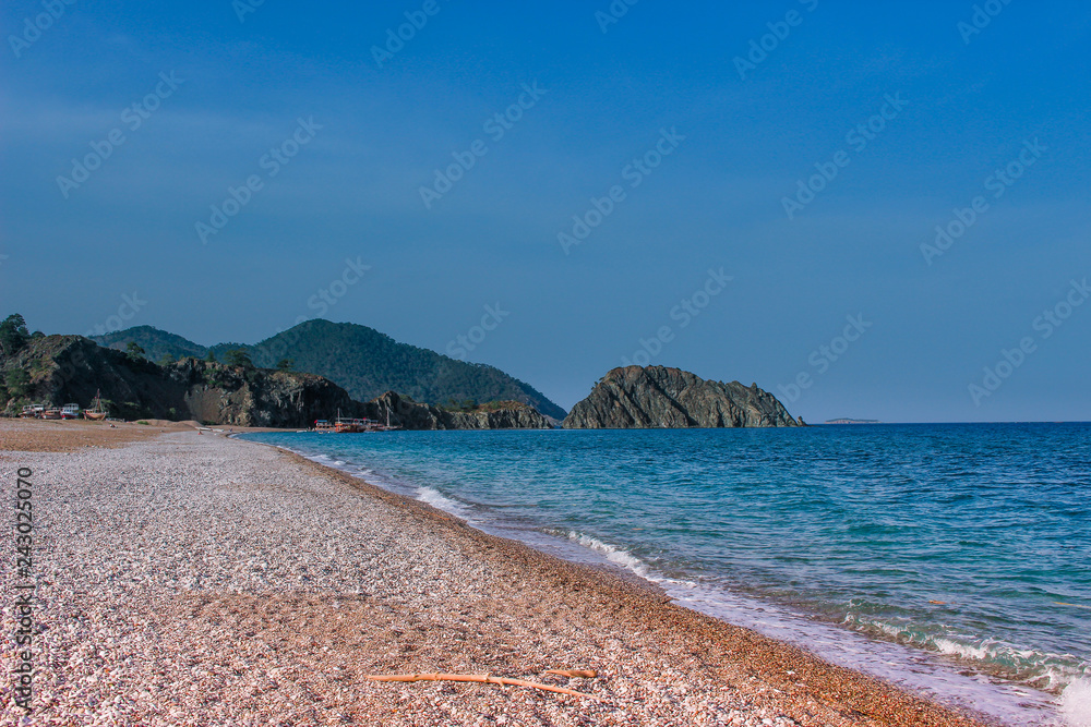 View of the beautiful sandy beach on the blue Mediterranean sea. Turkey