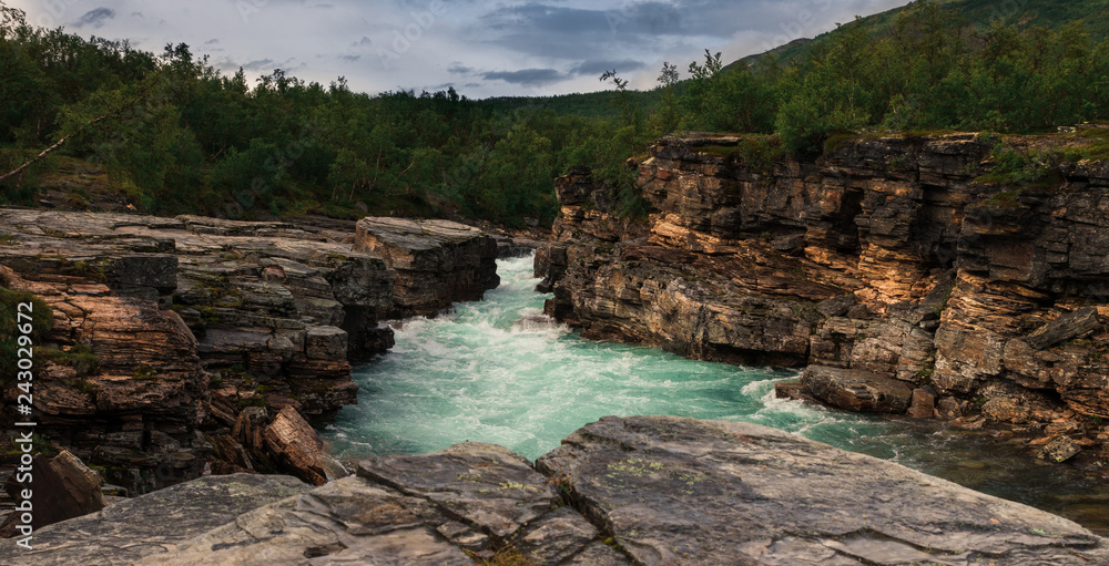 Abisko river in the canyon close to Abisko Fjällstation in northern Sweden at the start of Kungsleden. Abisko river in the canyon close to Abisko Fjällstation in northern Sweden at the start of Kungsleden.