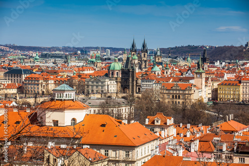 Charles bridge and Prague city old town seen from Petrin hill in a beautiful early spring day