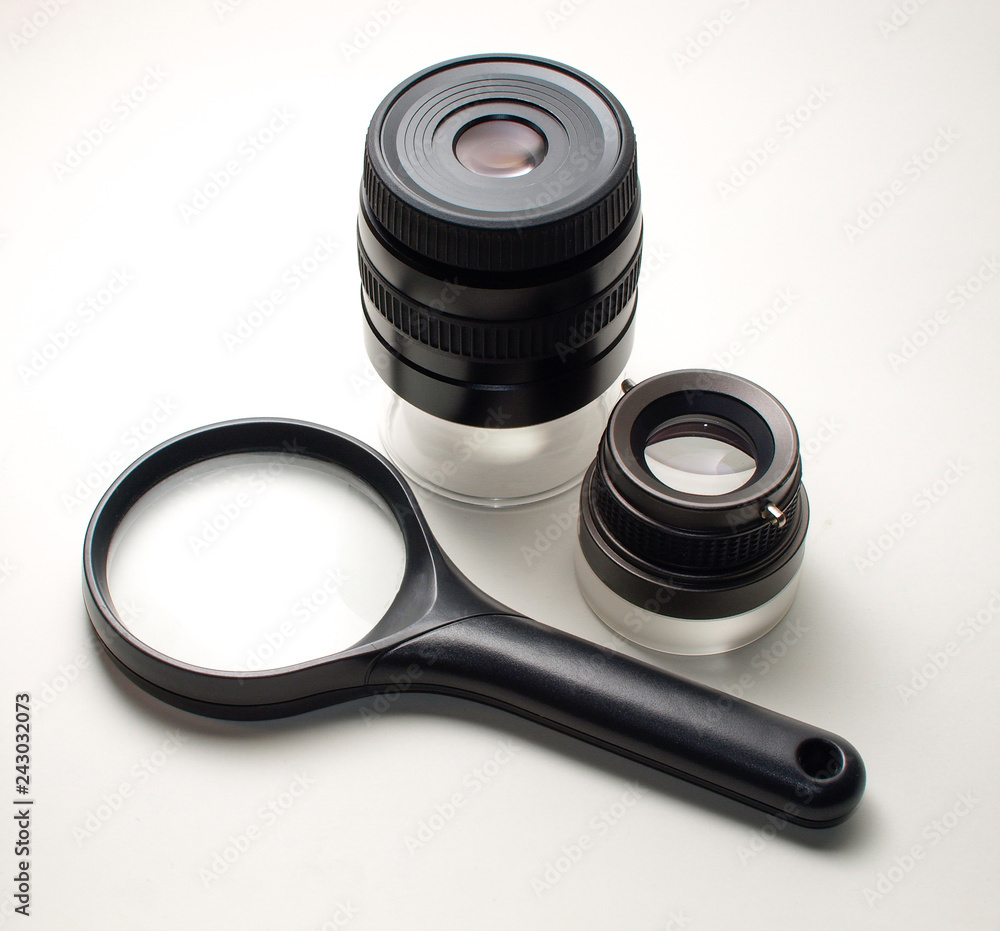 Different types of magnifying glasses a one simple loupe, one with a