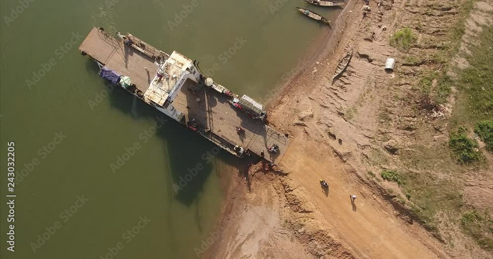 aerial static view of vehicles and motorcycles get on ferry boat aerial static view of vehicles and motorcycles get on ferry boat
