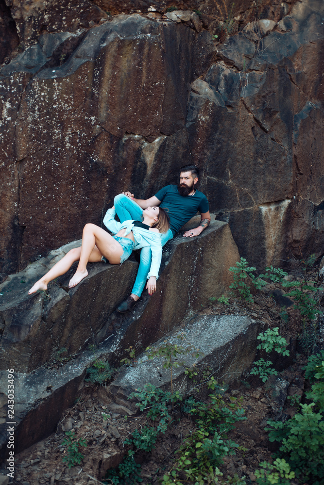 A little time to relax. Sensual couple on vacation trip. Sexy woman and bearded man on natural landscape. Couple enjoy love and romance. Couple in love on summer vacation