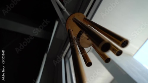 a bunch of small items that make a chime when the wind blows and when you open the door