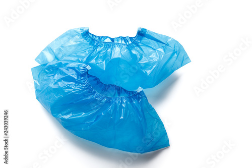 Wallpaper Mural Two blue medical Shoe covers for feet isolated on white background. Hygiene and cleanliness in health facilities Torontodigital.ca