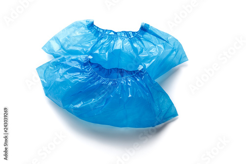 Wallpaper Mural Two blue medical Shoe covers for feet isolated on white background. Hygiene and cleanliness in health facilities Torontodigital.ca