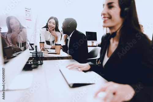 Team of Managers Working in Modern Call Center.