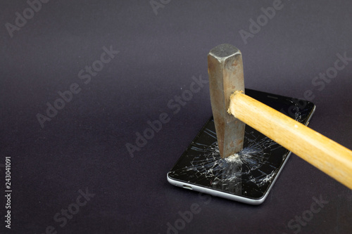 Wallpaper Mural Phone screen crash or durability, endurance test concept on the black background. It could be used in technological area, news, etc. Torontodigital.ca