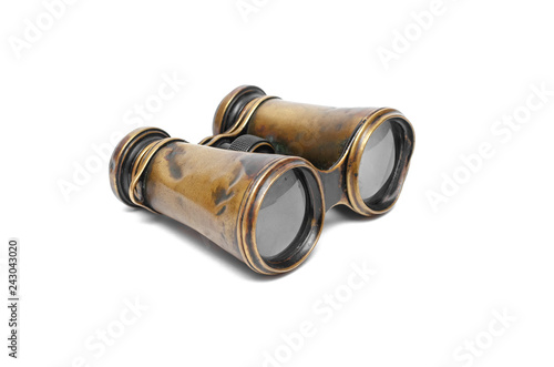 Vintage binoculars isolated on the white background.