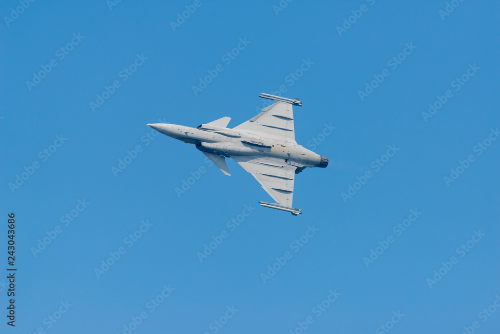 Gripen 39d jet aircraft soaring through the sky. Gripen 39d jet aircraft soaring through the sky.