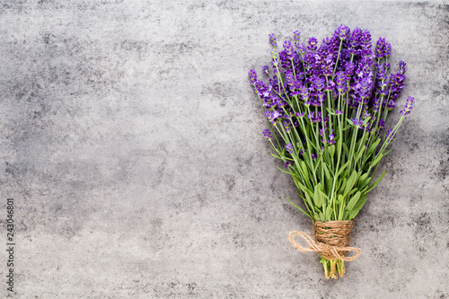 Fototapeta Naklejka Na Ścianę i Meble -  Lavender flowers, bouquet on rustic background, overhead.