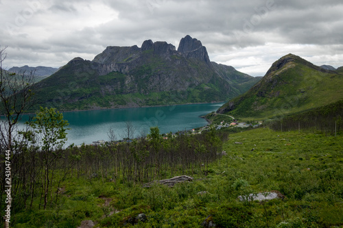 View of the fjord and mountains where there are clouds in the sky
