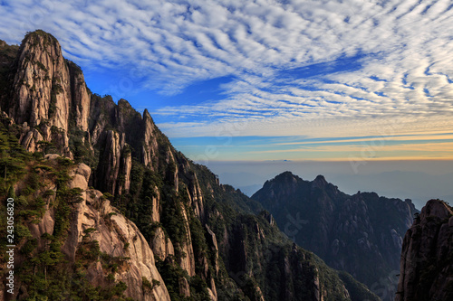 Sanqingshan, Mount Sanqing National Park Sunset, Jiangxi Province, China. National Geopark and Sacred Taoist Mountain, UNESCO World Heritage. China Cliff Walk, walkway suspended along mountain cliff