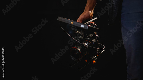 Camera and videographer's Hand