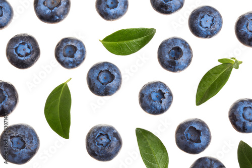 fresh ripe blueberry with leaf isolated on white background. Top view. Flat lay pattern