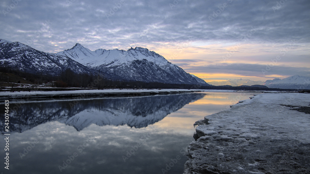 Alaska reflection winter mountains and lake