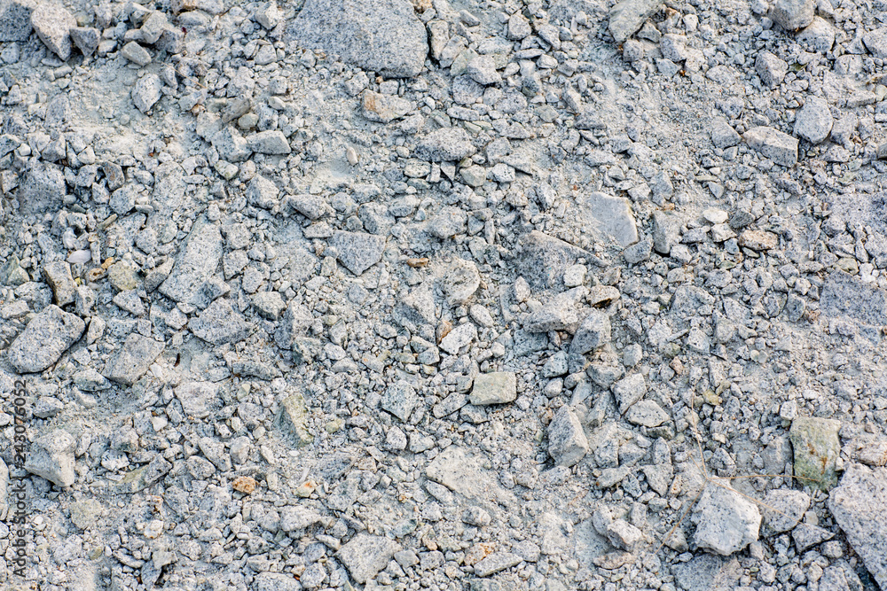 Crushed rock Different shapes and sizes for background . Stone gravel texture use for background, crushed rock for construction. pure gray rock. many rock background. Crushed rock Different shapes and sizes for background . Stone gravel texture use for background, crushed rock for construction. pure gray rock. many rock background.