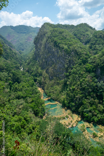 Ariel View of Semuc Champey Swimming Holes in Guatemala Vertical