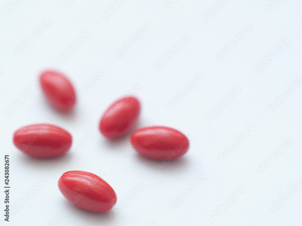 red pills on white background red pills on white background